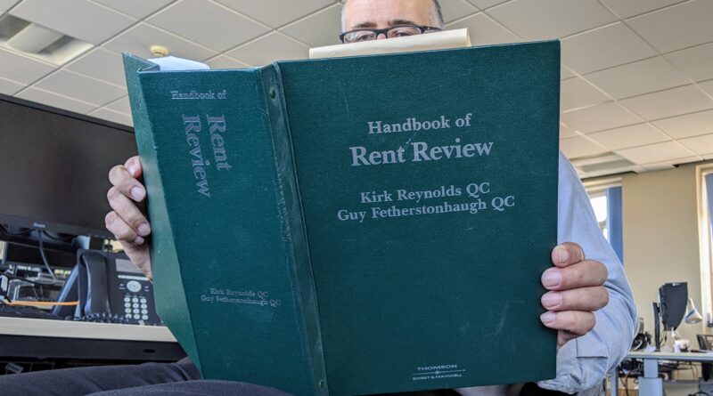 Matt reading a rent book