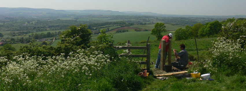 Rangers and volunteer working on Brading Down LNR, Isle of Wight