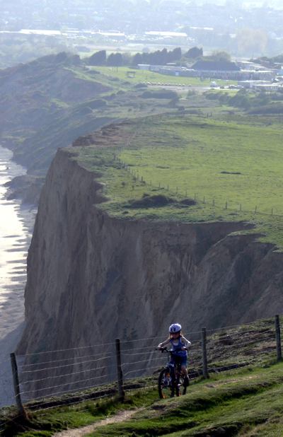 Cyclist on coastal footpath, Redcliff, Isle of Wight