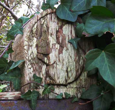 Squirrel carving on gate